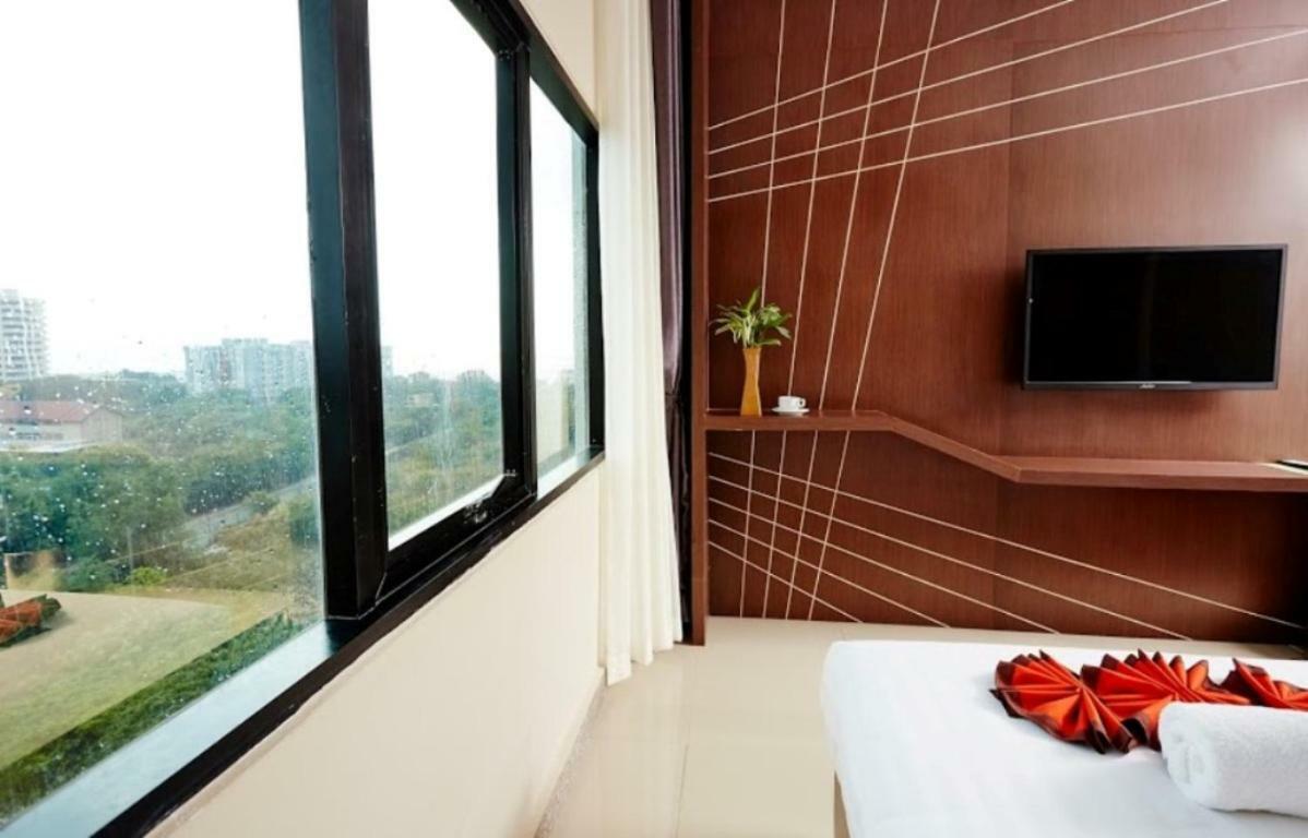 Ease Jomtien Hotel Extérieur photo